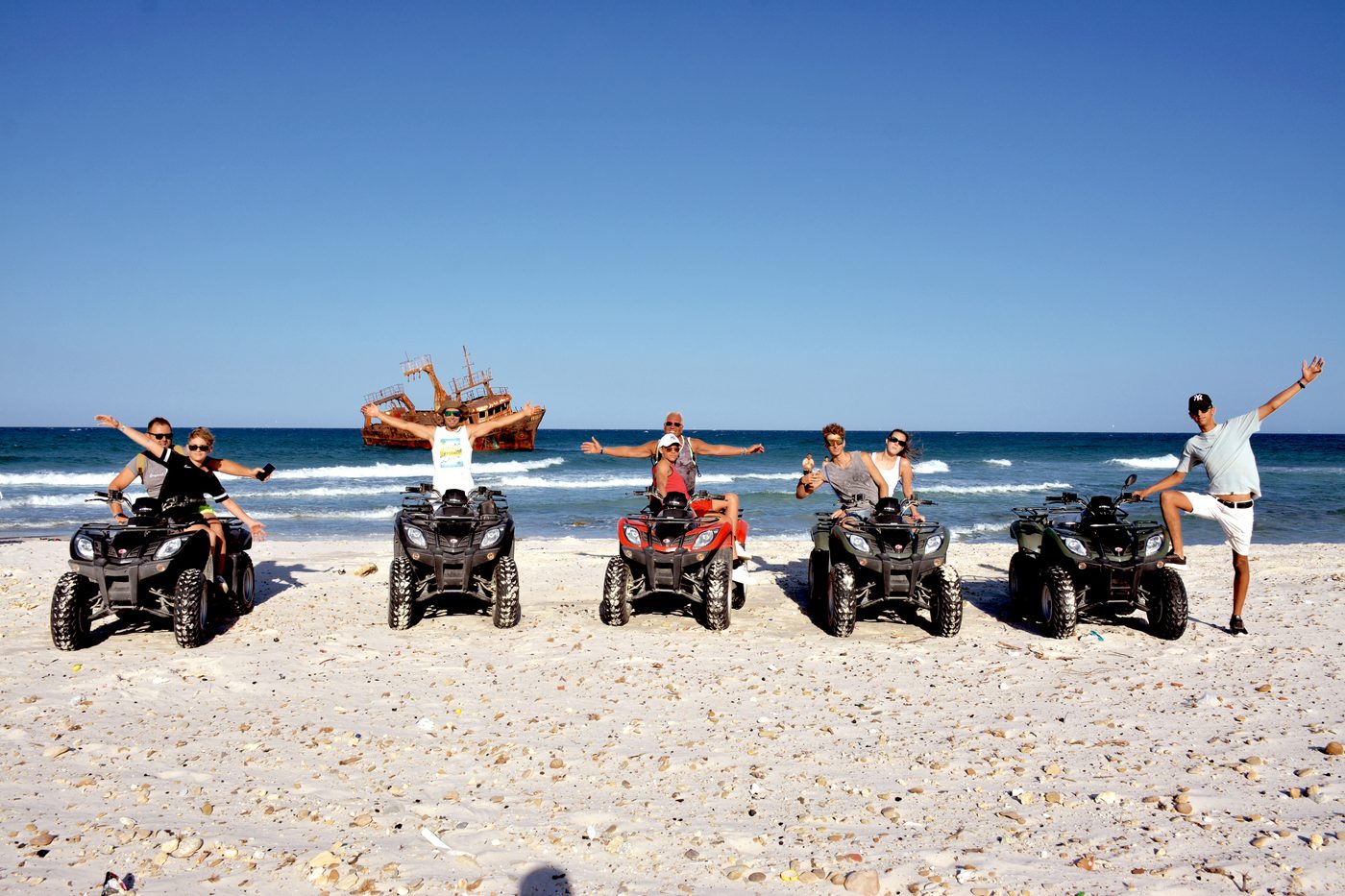 Quads beside the wreck · Mansoura shore